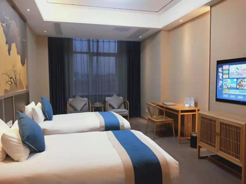 Feicheng Blossom Hotel Zewnętrze zdjęcie
